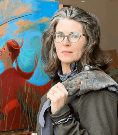 Artist Nicole Alger standing in her studio beside one of her vibrant figurative paintings on an Artefex panel.